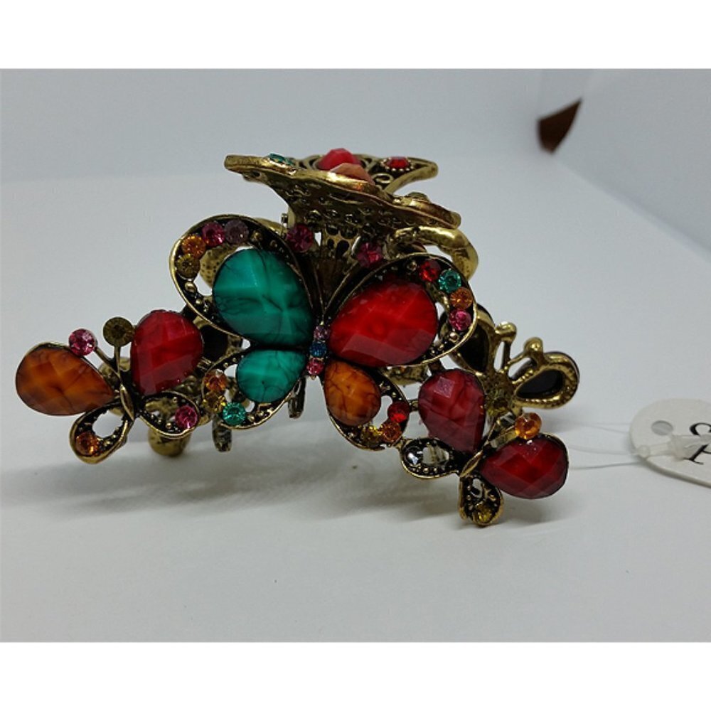 New butterfly jaw hair clip colorful vibrant fun statement bejeweled look.